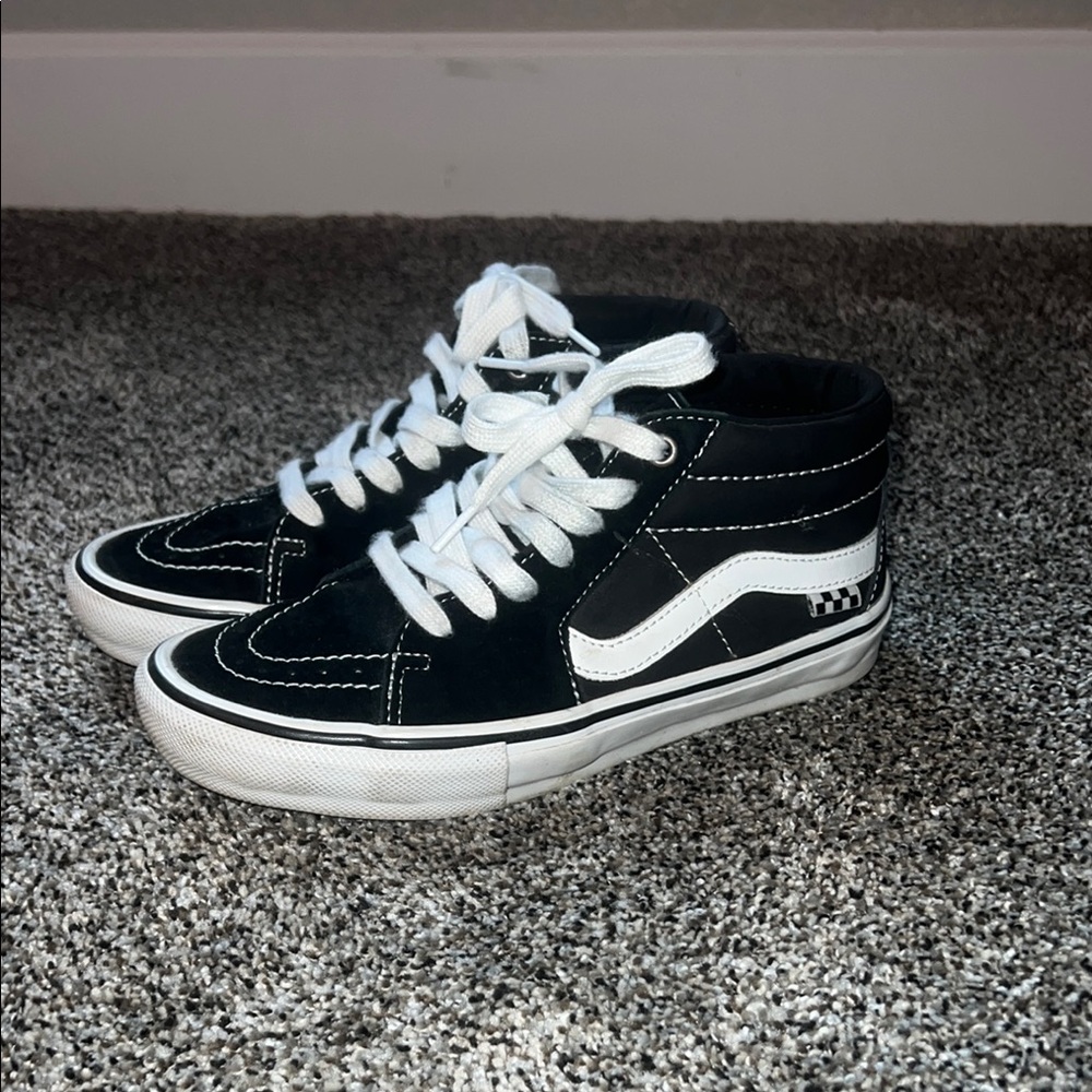 Vans Black and White High-Top Sneakers